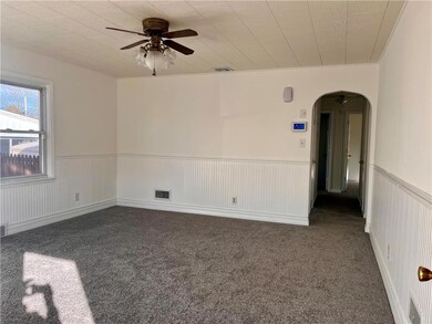 From front door, hallway to bedrooms & kitchen
