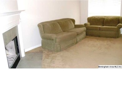 spacious great room with wood burning fireplace ha