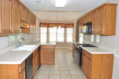 Large kitchen with breakfast area and breakfast ba