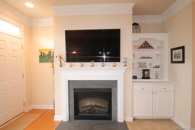 Slate surround gas log fireplace with built-ins