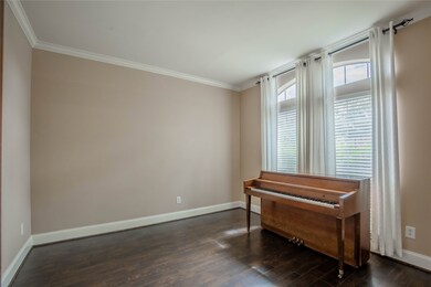 An inviting study with large windows, perfect for