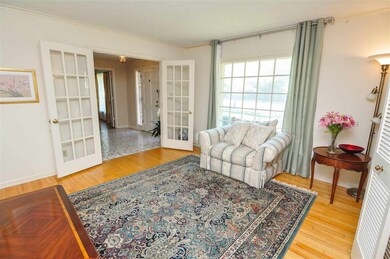 French doors from the entry lead you into the form
