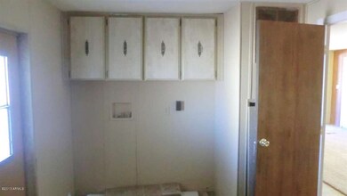 LAUNDRY ROOM WITH CABINETS