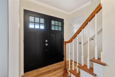 Entryway/Foyer featuring exquisite double doors