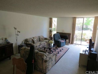 Bright and open living room with patio doors overl