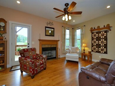 Great Room with Fireplace and access to Back Deck