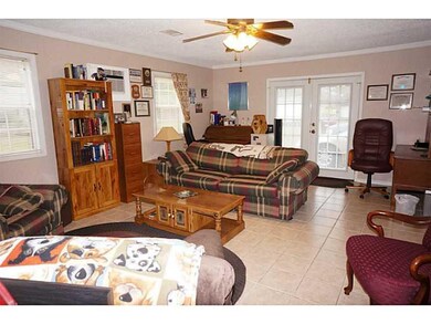 Den/Family/Great Room. Den has half bath & could b