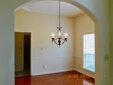LARGE DINING ROOM WITH HARDWOOD FLOOR AND UPDATED 