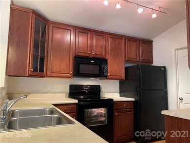 Upgraded cherry cabinets and plenty of counter spa