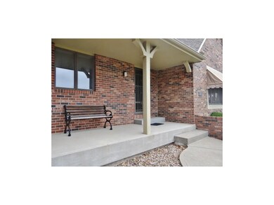 The front entryway offers a large covered front porch.