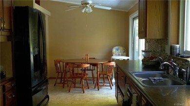Eat-in area of kitchen has sliding glass doors to 