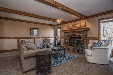 New carpet, fresh paint, gas fireplace.