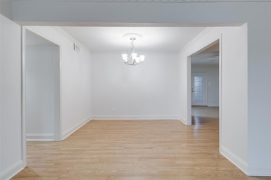Unfurnished dining area featuring light wood finis