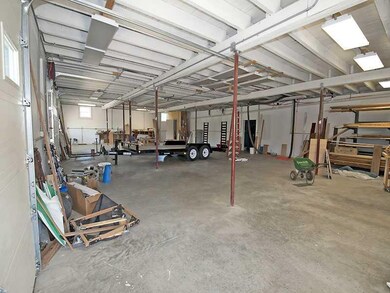 Parking Lot/Garage. Room for 4 vehicles and storag