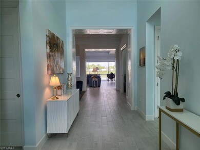 Hall featuring baseboards and light wood-type flooring