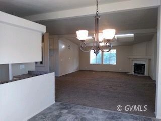 VIEW FROM DINING ROOM TO LIVING ROOM