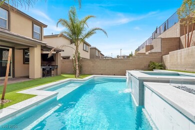View of swimming pool with a fenced in pool, an in