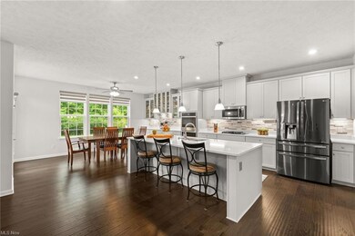 Kitchen featuring a kitchen island, stainless stee