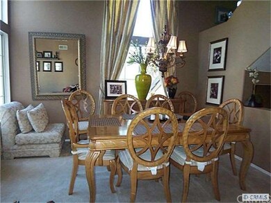 Large Dining Area with Beautiful Chandelier and El