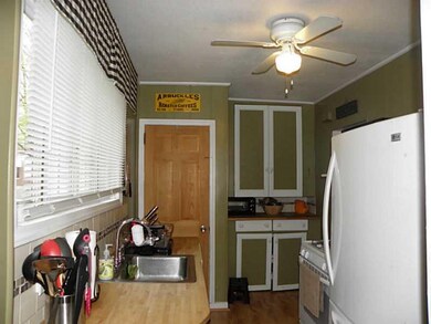 Kitchen. Ceramic Tile Backsplash & Large Pantry ar