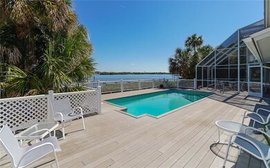Expansive deck and pool overlooking the bay. 