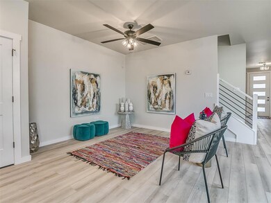 Sitting room with light hardwood / wood-style floo