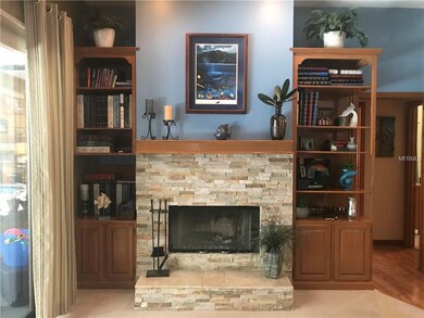Wood-Burning Fireplace With Custom Built-In Shelfi