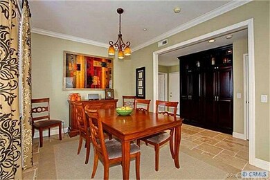 Large breakfast nook is open to the kitchen and ha