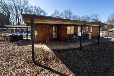 Back of property with cooling unit