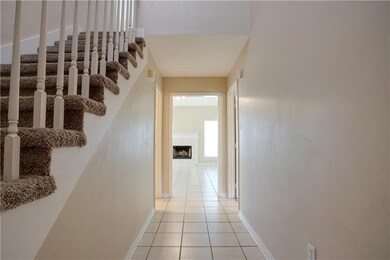Enter through the front door into a hallway. The p