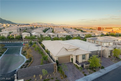Aerial view at dusk of a residential view and a mountain view