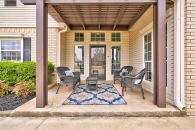 View of patio / terrace with a pergola and an outd