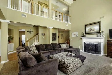 The expansive, open floor plan includes two sets of staircases.