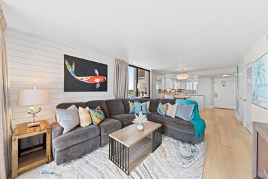 Living room flooded with natural light.