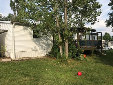 Covered deck in private back yard.