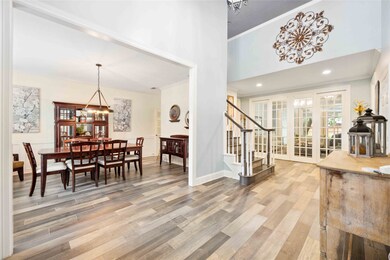 Elegant dining room off entry.