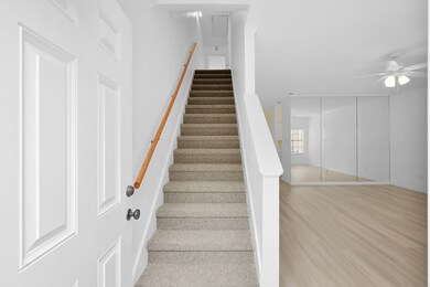 2 story townhome with new carpet.