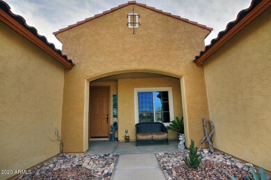 6963 W Springfield Way-large-005-031-Fro