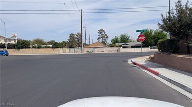 View of street with traffic signs, sidewalks, and