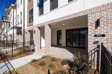 View of terrace , Front Entry with sliding glass d