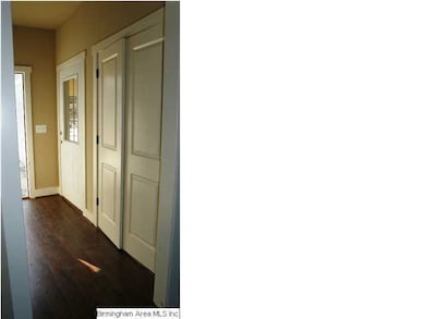 Foyer with solid surface flooring