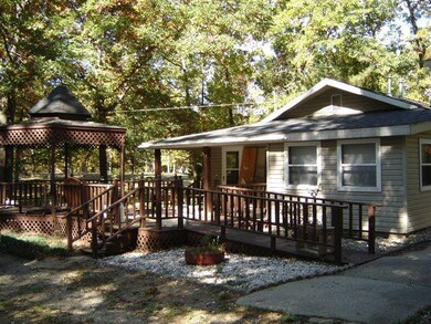 7688 N Woodbridge Rd, White Cloud, MI 49349 - photo 4