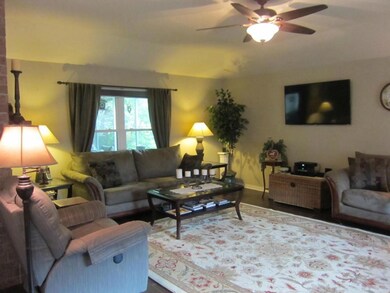 Your spacious den with fireplace, built in TV and