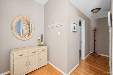 Hallway with light wood-type flooring