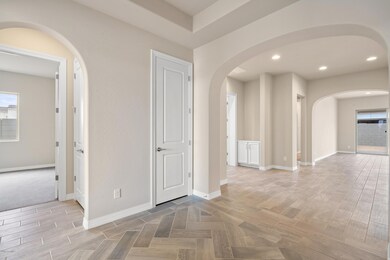 Foyer and den