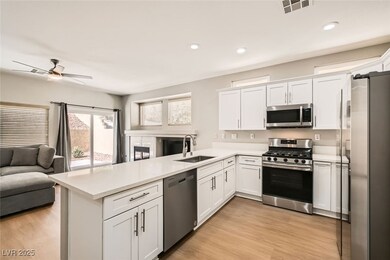 Kitchen with appliances with stainless steel finis