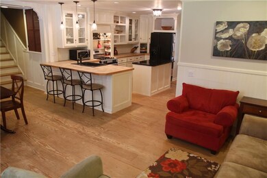 Family room and dining area complete this space, a