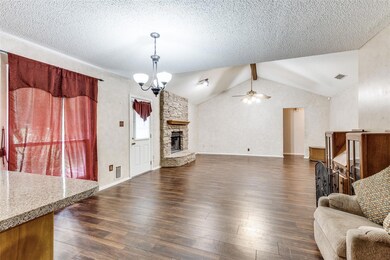 Living room with dark hardwood / wood-style floori