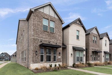View of property with a front lawn
