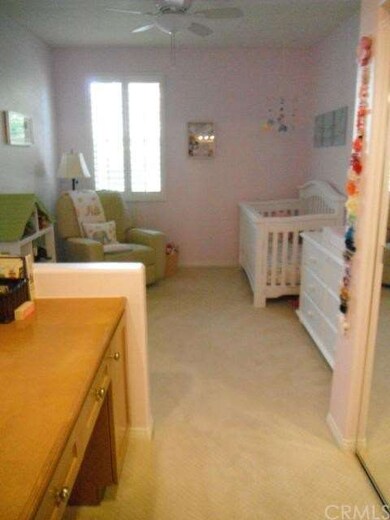 Downstairs Bedroom with Built-In Desk and Private 